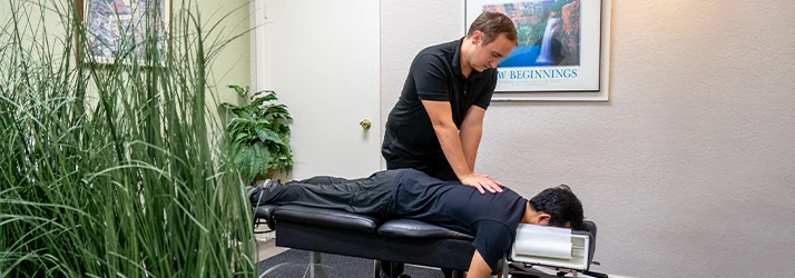 Chiropractor San Antonio TX Austin Smiciklas Adjusting Patients Back Chiropractor Austin Smiciklas Adjusting Patients Back